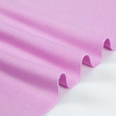 180gsm polyester dörd yollu uzanan trikotaj parça düz toxunuşlu 100D144F iplik yüksək elastik rəqs paltarı stokda