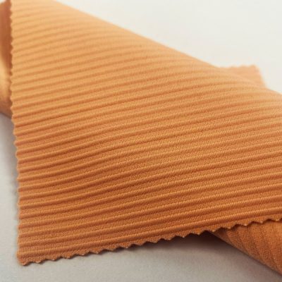 Tissu en fil de nylon 3D 260 g/m², 84 % nylon, 16 % élasthanne.
